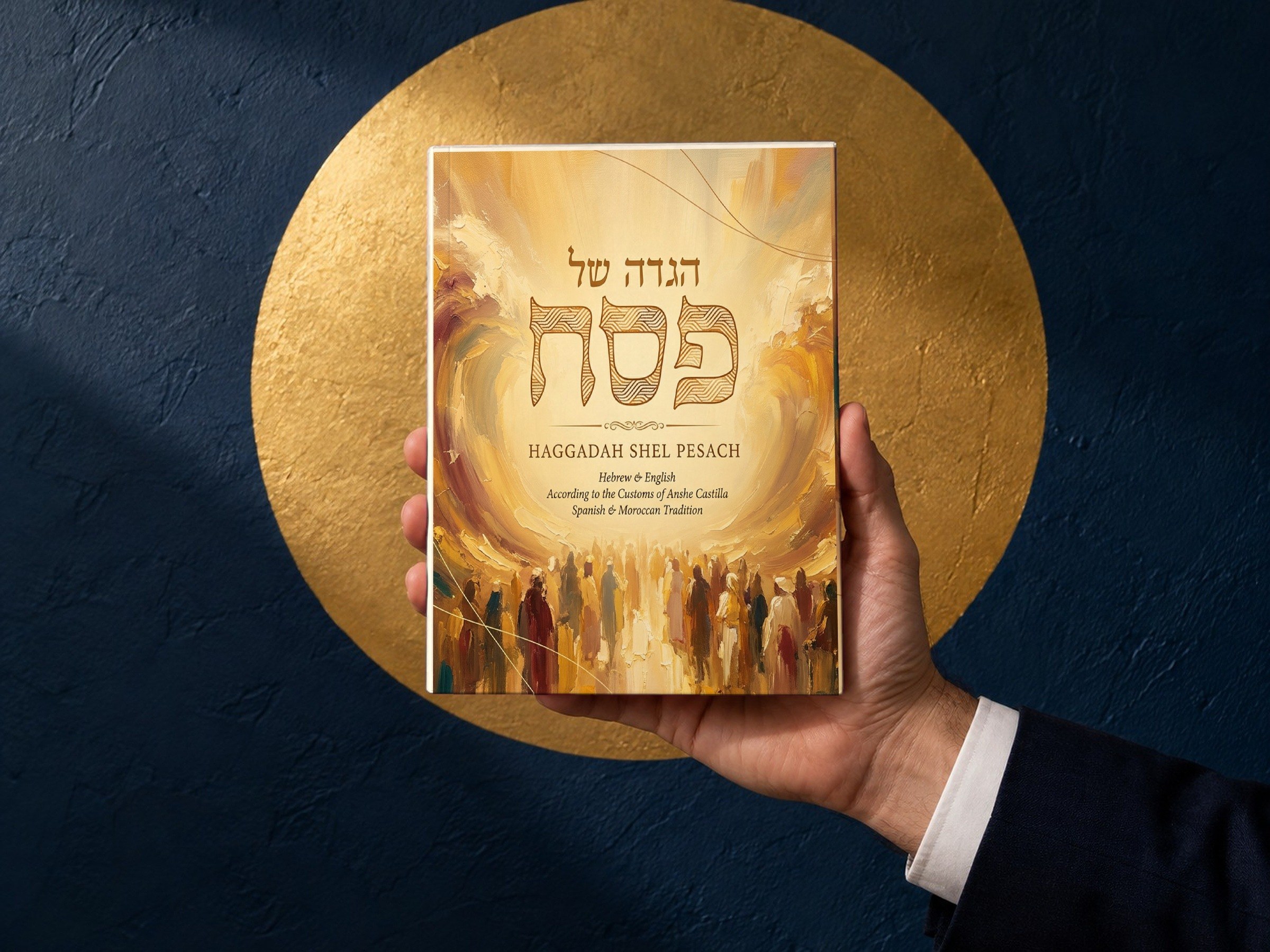 The Haggadah held up in front of a gold circle on a navy wall.